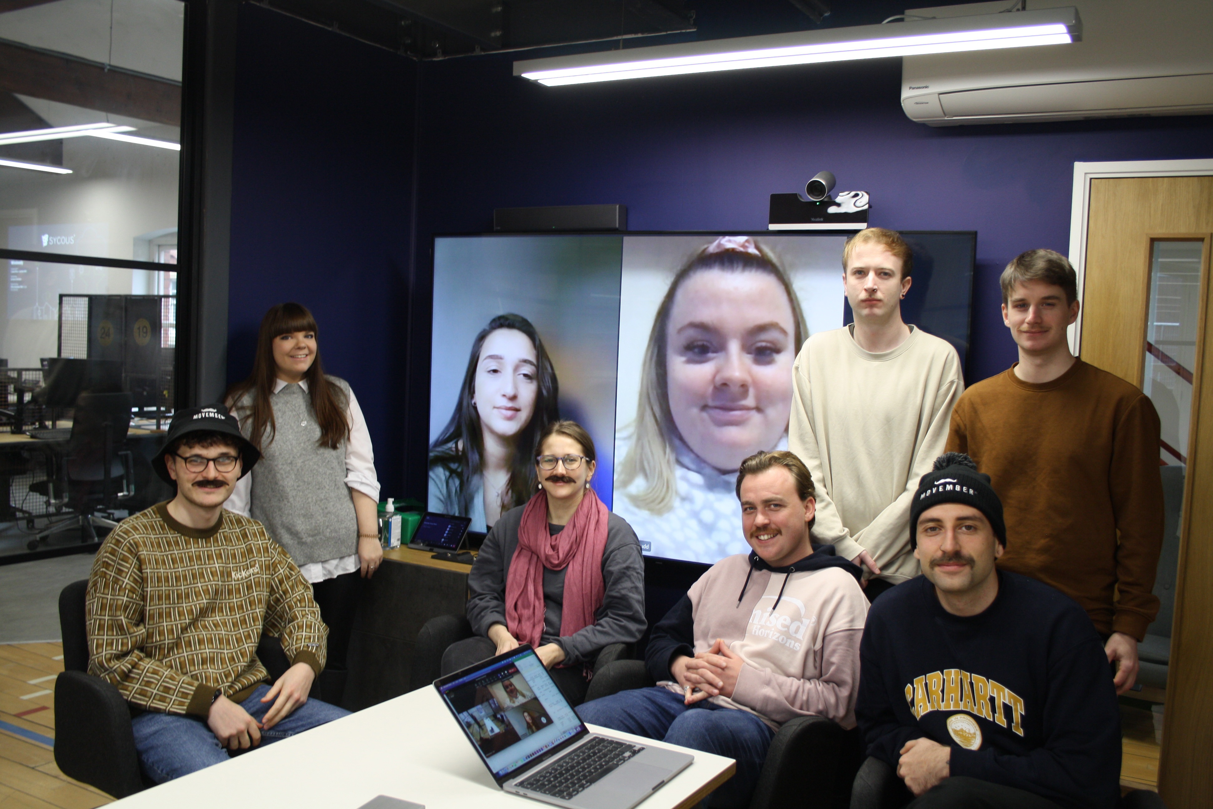 Movember group photo in Sycous office